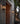 Original BTC brass wall lantern on a brick exterior wall