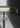 Oluce Dora floor lamp in black nickel with smokey grey glass shade