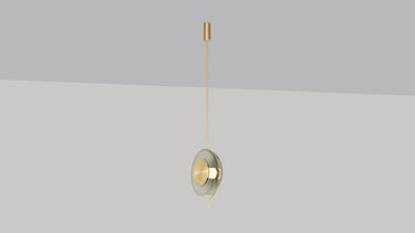 Pendulum pendant light in satin brass with a smoked glass shade, studio view