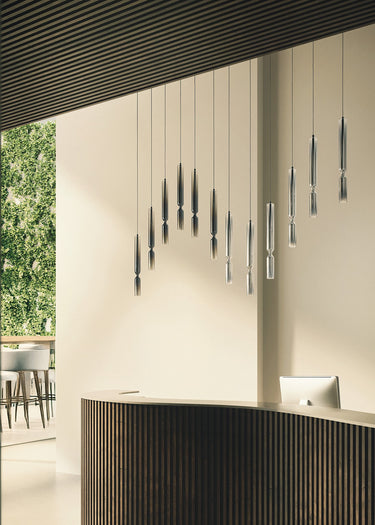 Penta Misty pendant lights hanging in a reception area