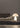 Oluce Atollo designer table lamp in opaline glass with hemisphere shade and cylindrical base