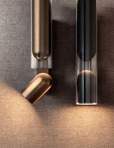 Penta Clash wall sconce by Artefatto, metal core inside a clear glass shell