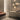 Group of gold Penta Enoki wall sconces in a hotel lobby
