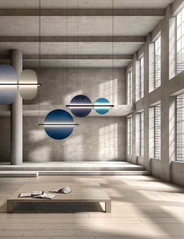 Penta Hang Out linear pendant with decorative panels hanging in a loft