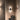 Penta Vela sail-shaped wall sconces lighting an interior wall