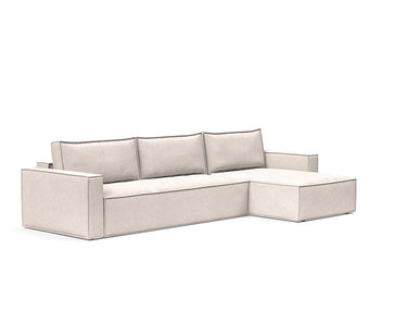 Newilla reversible lounger sleeper sofa with arms in 255 Adario Basmati fabric by Innovation Living in a modern living room setup