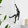Finesse Decor Climbing Couple Set of Two Wall Sculptures Matte Black and Gold