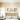 isual Comfort Photon 48 chandelier demonstrating its large 48-inch scale in a room