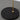 Heron floor lamp with a satin brass shade on a black marble base