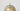 Close-up of the satin brass disc and smoked glass shade of the Pendulum floor lamp