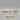 Avalon Halo chandelier in satin brass, unlit, showing the alabaster cylinders