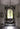 Lyndon pendant light by Oluce in an entryway, lifestyle view