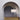 Braque table lamp on a gold plinth framed by a curved archway
