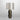 Ring table lamp in bronze with satin brass details and a dove grey silk shade, studio view