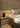 Cylinda table lamp by Oluce with integrated 12.5W LED and minimalist metal design