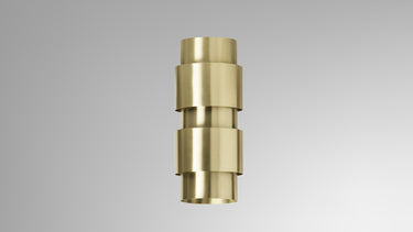 Short Ring wall light in satin brass with stacked metal rings, studio view