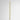 Artes 1200 wall light in satin brass with an alabaster diffuser, studio view