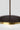 Close-up of the Carapace pendant's bronze outer shade, brass inner shade and opal glass