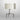 Braque table lamp in bronze with a hand-cast three-legged base and an oval dove grey shade, studio view