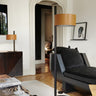 Parallel Floor Lamp by Oluce with hammered leather brown lampshade and black metal stem