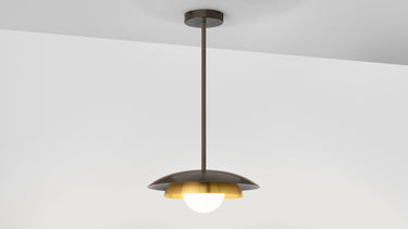 Carapace pendant on a bronze drop rod, with layered bronze and brass shades over an opal glass globe