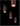 Coppery bronze A-Tube ceiling light fixture by Lodes illuminating a modern living room ceiling