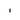 Matte black A-Tube ceiling flush mount by Lodes paired with energy-efficient LED bulb