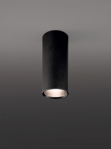 Modern tubular LED ceiling light A-Tube by Lodes featured in designer kitchen interior in matte black finish