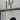 Matte white A-Tube ceiling flush mount by Lodes paired with energy-efficient LED bulb