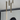 Matte white A-Tube ceiling flush mount by Lodes paired with energy-efficient LED bulb