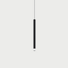Lodes A-Tube Nano slim LED pendant light in matte black, showcasing its minimalist Italian design and linear profile, ideal for modern dining rooms or kitchen islands.
