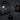 Black perforated AMS cube lamps glowing at night
