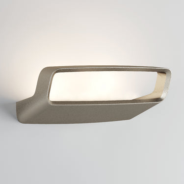 Aile wall sconce by Lodes in matte champagne finish with integrated LED lighting