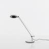 Demetra Micro Desk Lamp by Artemide, modern LED task light for home offices and commercial spaces in White