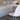 Adjustable Artemide designer table lamp with painted aluminum stem