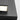 Close-up of the Aspen 26" outdoor wall sconce showing its sleek design and acrylic lens.