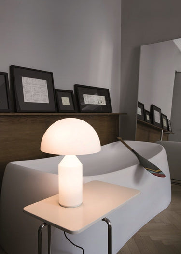 Dimmable LED Atollo Opal table lamp by Oluce for modern office desk lighting