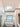 ET2 Aura pendant lit over a freestanding tub in a bathroom with a tall window