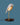 Almond Beige Bird lamp by Daqiconcept in profile on blue