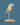 Aqua Blue Bird lamp by Daqiconcept in profile on blue