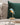 Aqua Blue Bird lamp by Daqiconcept among green and white cushions