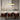 Adjustable crystal brass pendant light over table