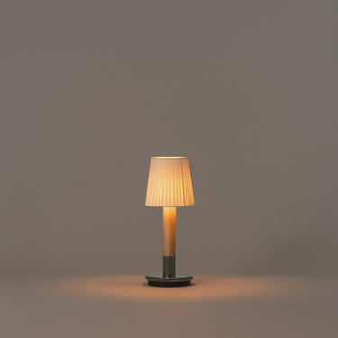 Basica Minima portable table lamp by Santa and Cole with rechargeable LED light