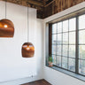 Natural Bell pendants hung together as a cluster, Graypants Scraplights, second view