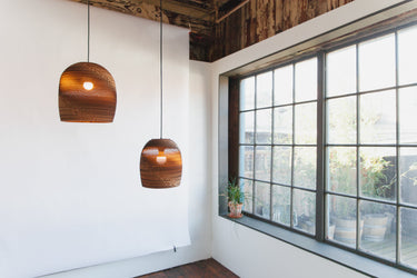 Natural Bell pendants hung together as a cluster, Graypants Scraplights, second view