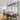 Black and wood farmhouse hanging light with 4 bulbs, ideal for kitchen islands and dining tables.