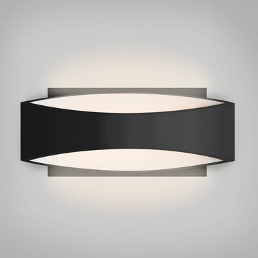 Besa Arc LED wall sconce in black finish mounted on a modern interior wall