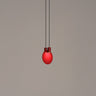 Bijou glossy pure red pendant light by Santa and Cole in modern living room