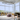 BlackJack Compass LED Hanging Light – Minimalist Round Ceiling Fixture installed in a hotel lobby
