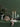 Red wine glass on a green table with candles | BELO by Frederike Martens for blomus